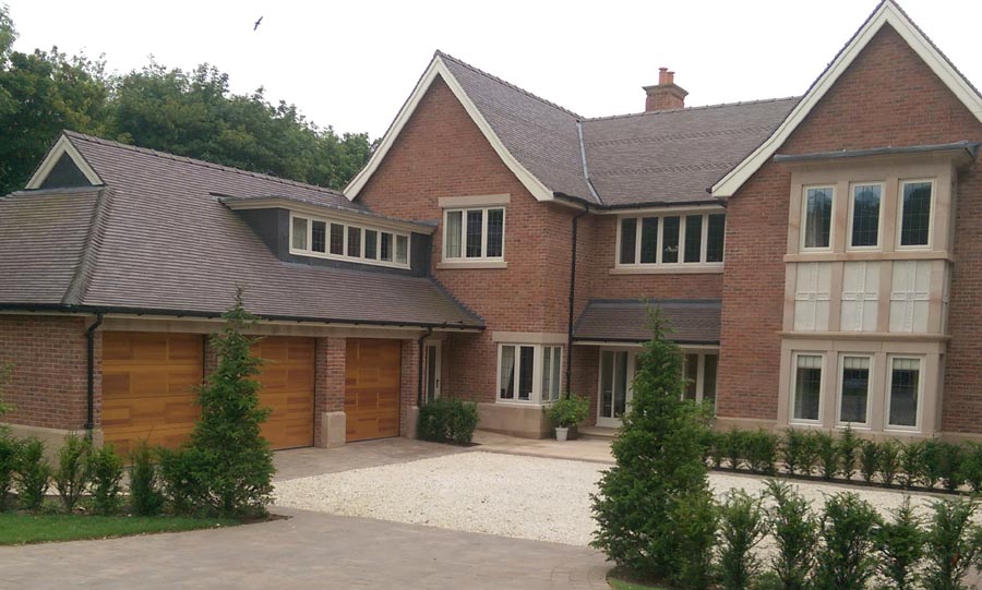 Dark heather rustics on a selfbuild house in Derbyshire